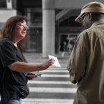 lady-handing-track-to-man